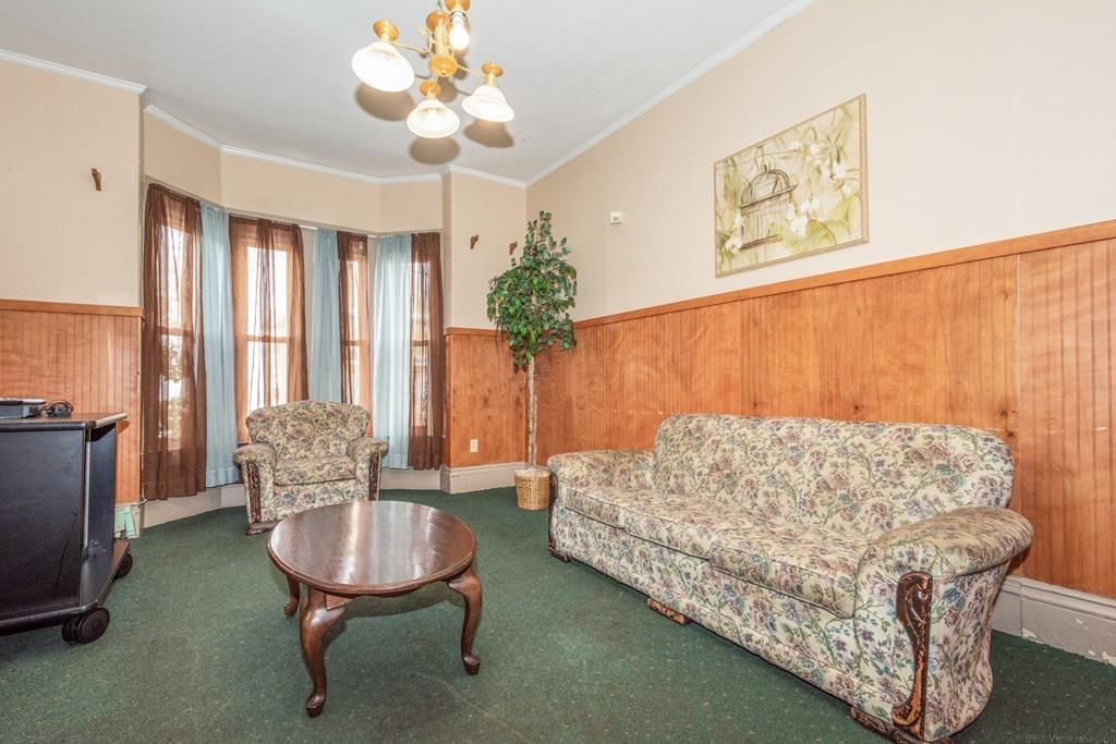 67 Congress Street Fitchburg, MA 01420 - Photo 6 of 39 a living room with furniture and a large window