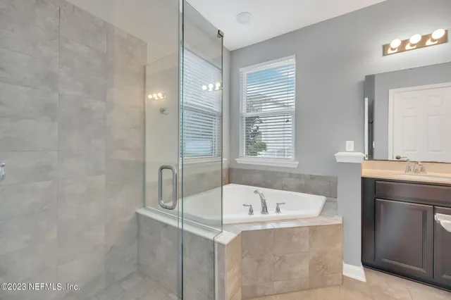 a bathroom with a sink and a bathtub