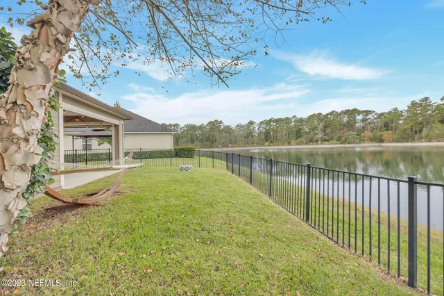 a view of a house with a big yard