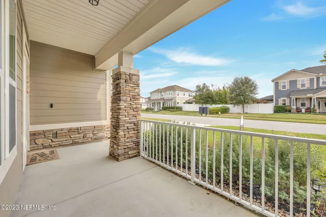 a view of a balcony with city view