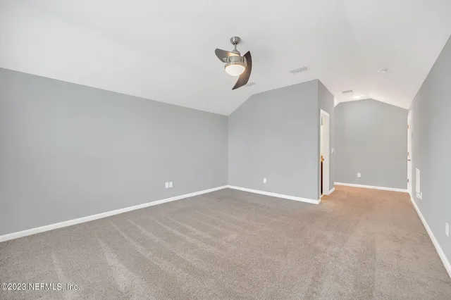 a view of a room with storage and utility room