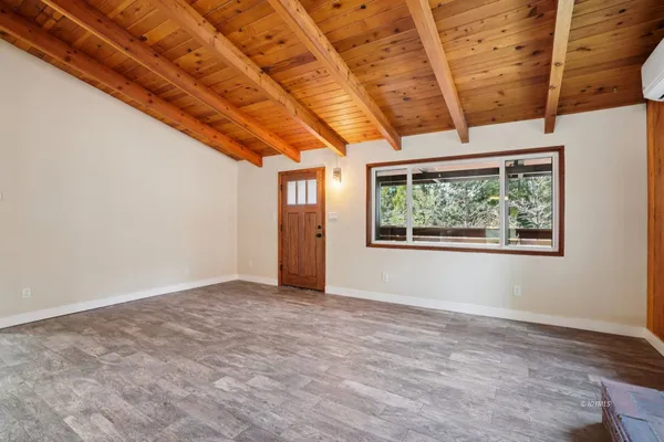 a view of a storage & utility room with wooden floor