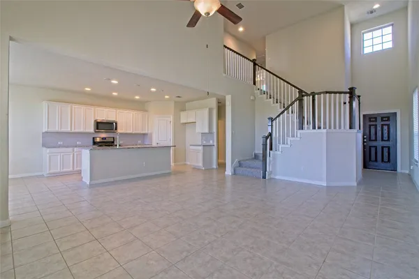 a view of a kitchen with furniture and a kitchen