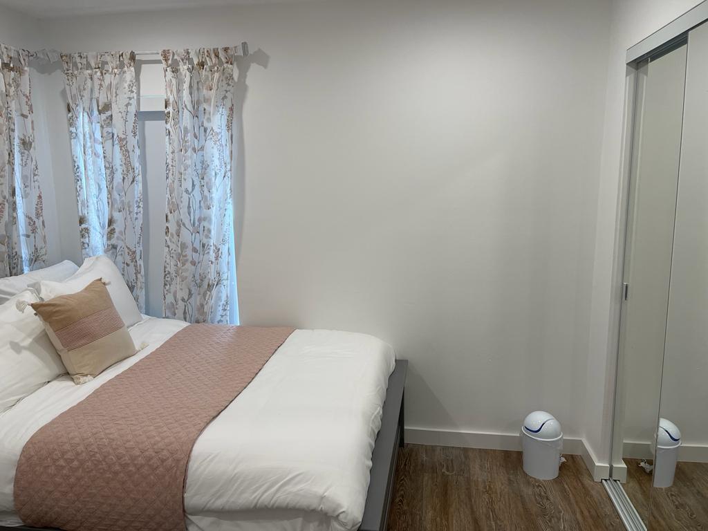 7360 San Sebastian Drive Boca Raton, FL 33433 - Photo 17 of 27 a bedroom with a bed and a toilet