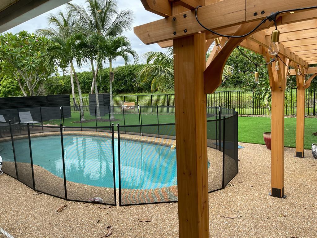 7360 San Sebastian Drive Boca Raton, FL 33433 - Photo 26 of 27 a view of a backyard