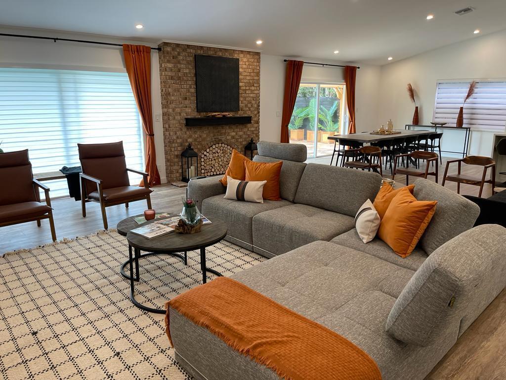 7360 San Sebastian Drive Boca Raton, FL 33433 - Photo 6 of 27 a living room with furniture kitchen view and a large window