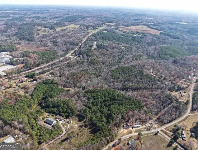 an aerial view of residential house and green space