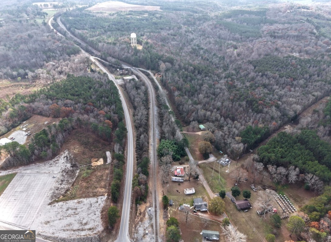 0 Sam Letson Industrial Road Haleyville, AL 35565 - Photo 26 of 28 a view of a forest with a yard