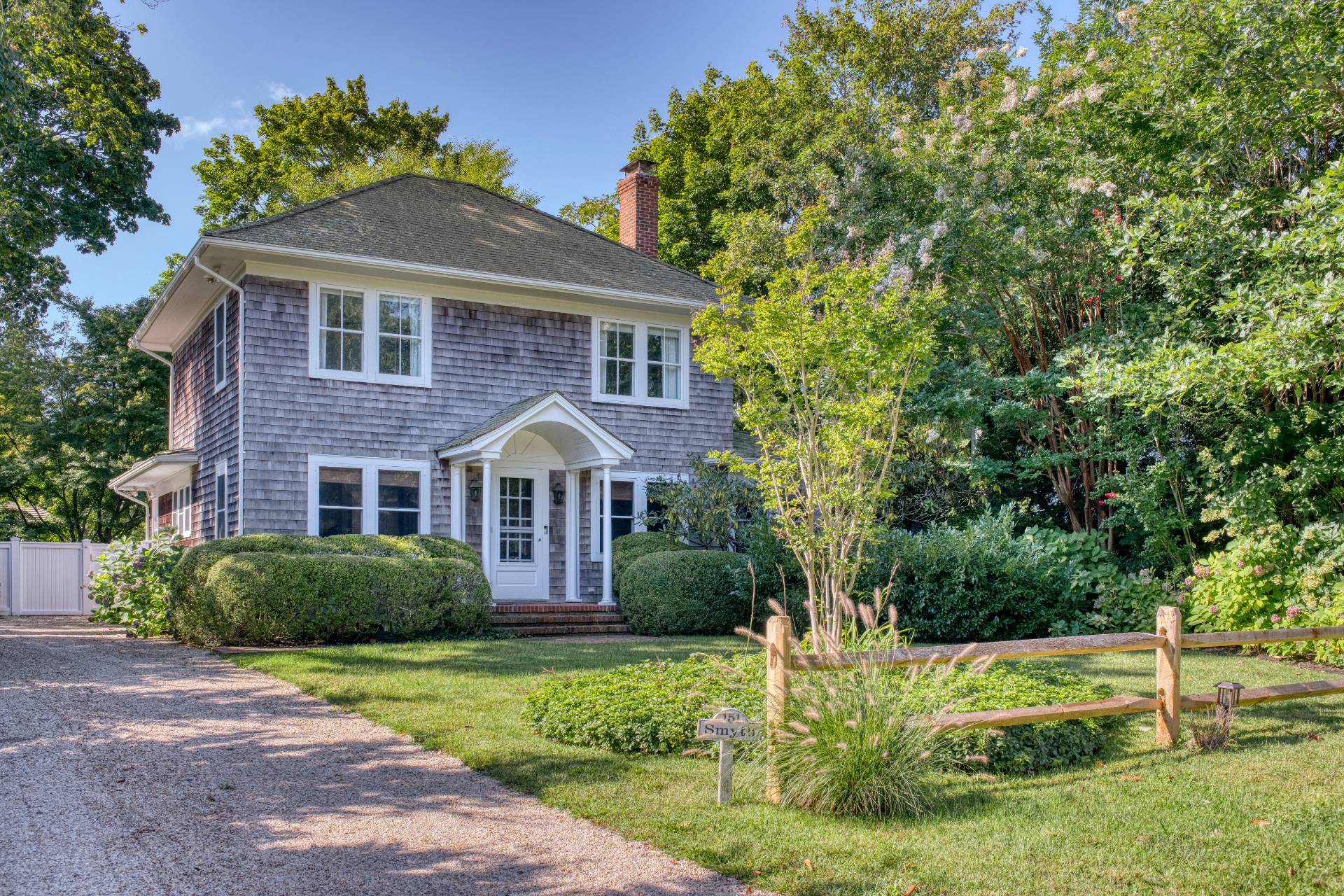151 Church Lane Bridgehampton, NY 11932 - Photo 21 of 21 a front view of a house with a yard