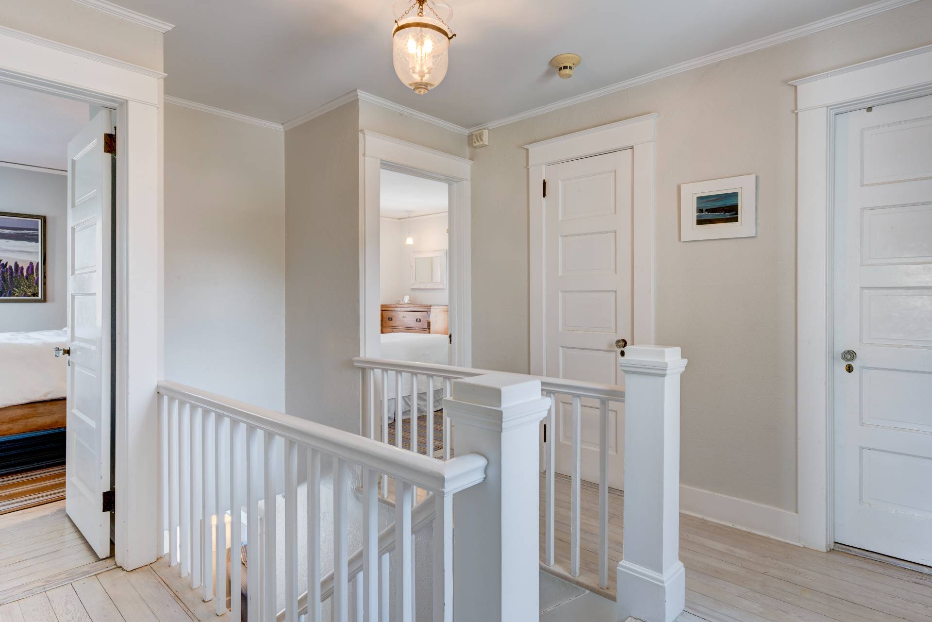 151 Church Lane Bridgehampton, NY 11932 - Photo 7 of 21 a view of a hallway with wooden floor and entryway