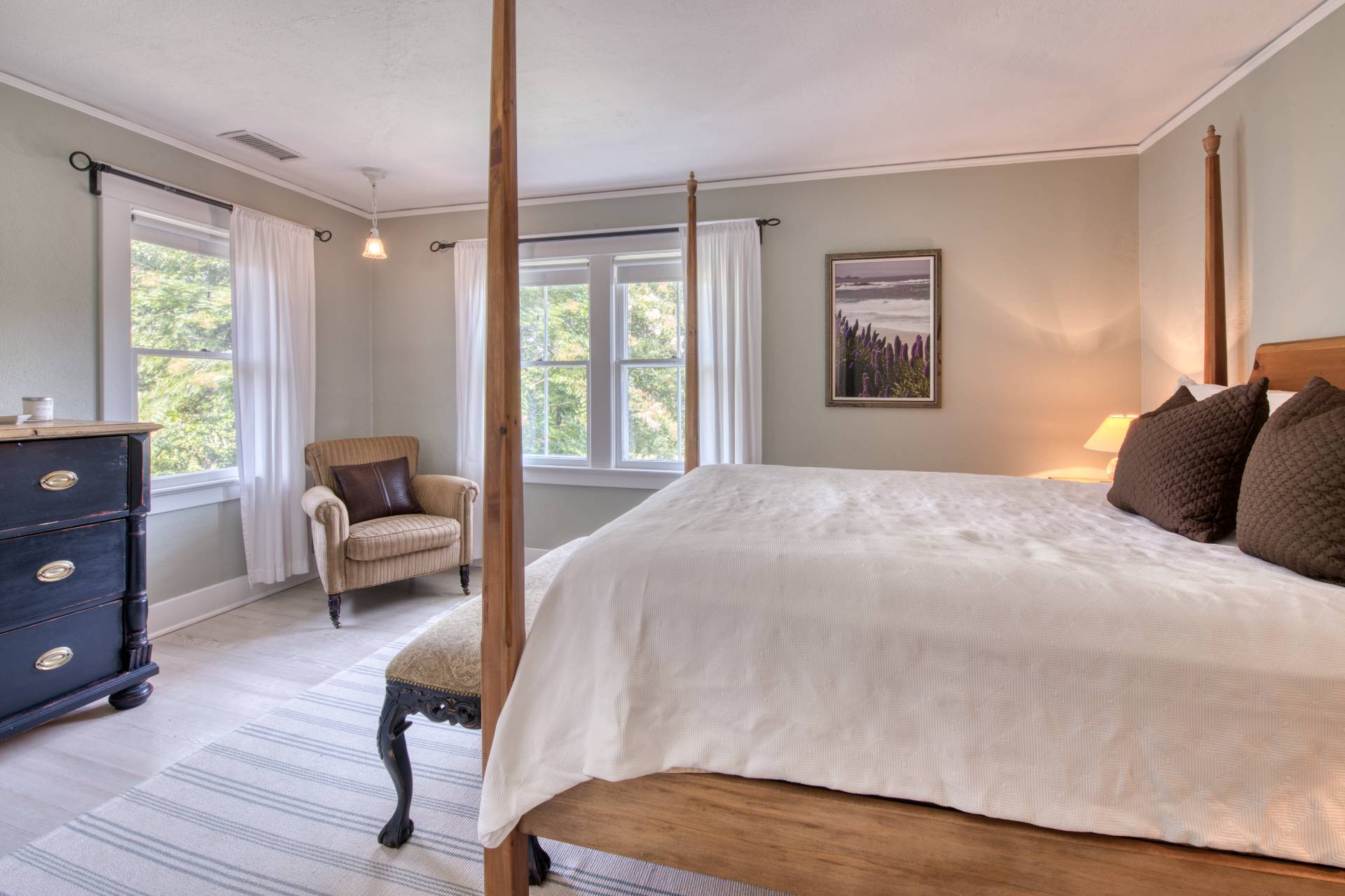 151 Church Lane Bridgehampton, NY 11932 - Photo 10 of 21 a bedroom with a bed and a couch