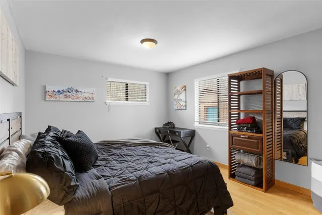 a bedroom with a bed and a closet