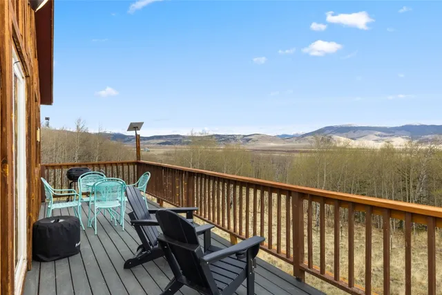 a view of balcony with furniture