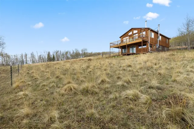 a view of a wooden floor with a yard