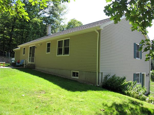 164 Brickyard Road Southampton, MA 01073 - Photo 13 of 14 a view of backyard with potted plants and large tree