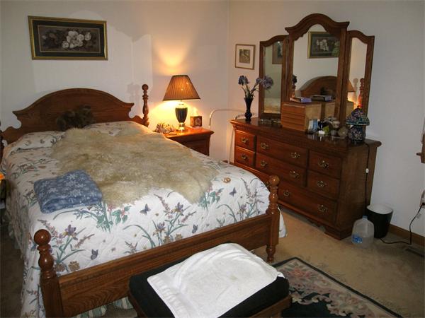 164 Brickyard Road Southampton, MA 01073 - Photo 8 of 14 a bedroom with a bed and a mirror on dresser
