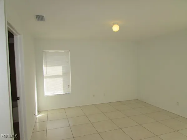 $1,750 | 1238 Denver Street East, Lehigh Acres, FL 33974