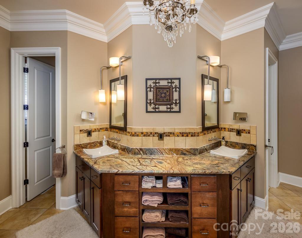 7315 Bay Ridge Drive Denver, NC 28037 - Photo 13 of 39 a bathroom with a granite countertop sink and a mirror