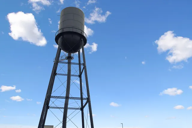 a view of a swimming pool with a lounge chairs