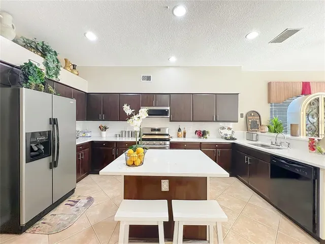 a living room with furniture or couch and a flat screen tv