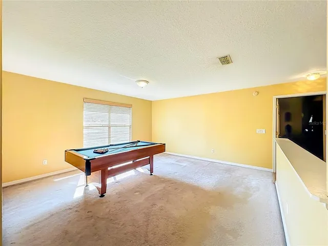 an aerial view of residential building with outdoor space