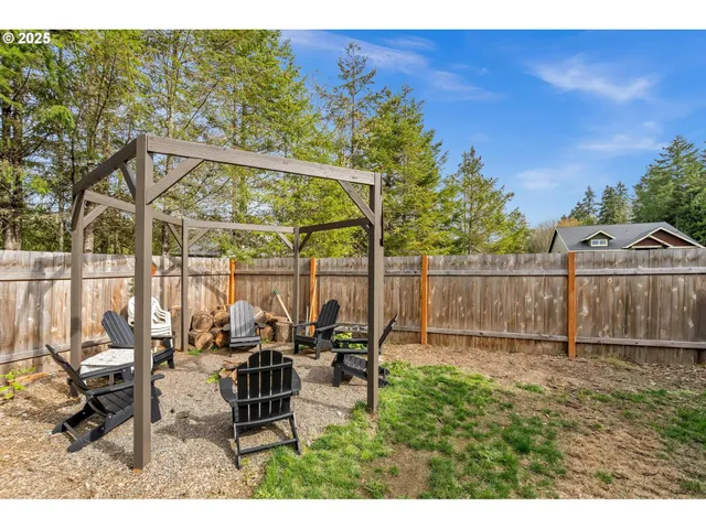 a childrens park with lots of swings slides and swimming pool