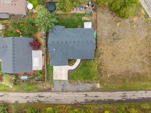 a brick building with a yard