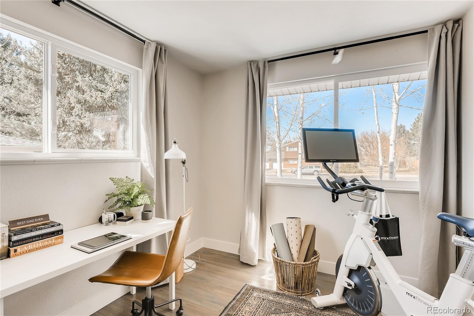 3530 East Orchard Road Centennial, CO 80121 - Photo 12 of 35 a view of a workspace with furniture and a window