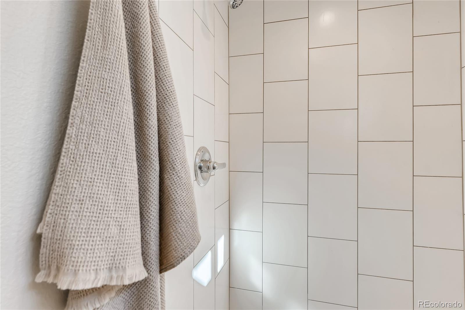 3530 East Orchard Road Centennial, CO 80121 - Photo 25 of 35 a bathroom with a shower