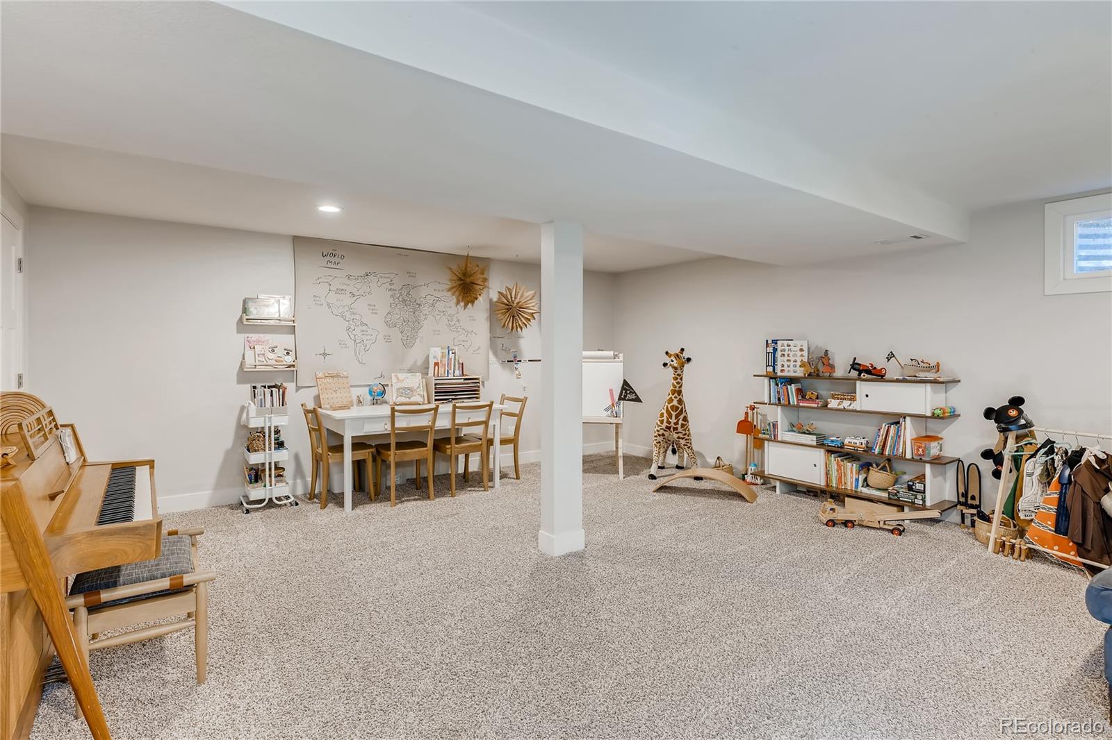 3530 East Orchard Road Centennial, CO 80121 - Photo 27 of 35 a living room with furniture and a table