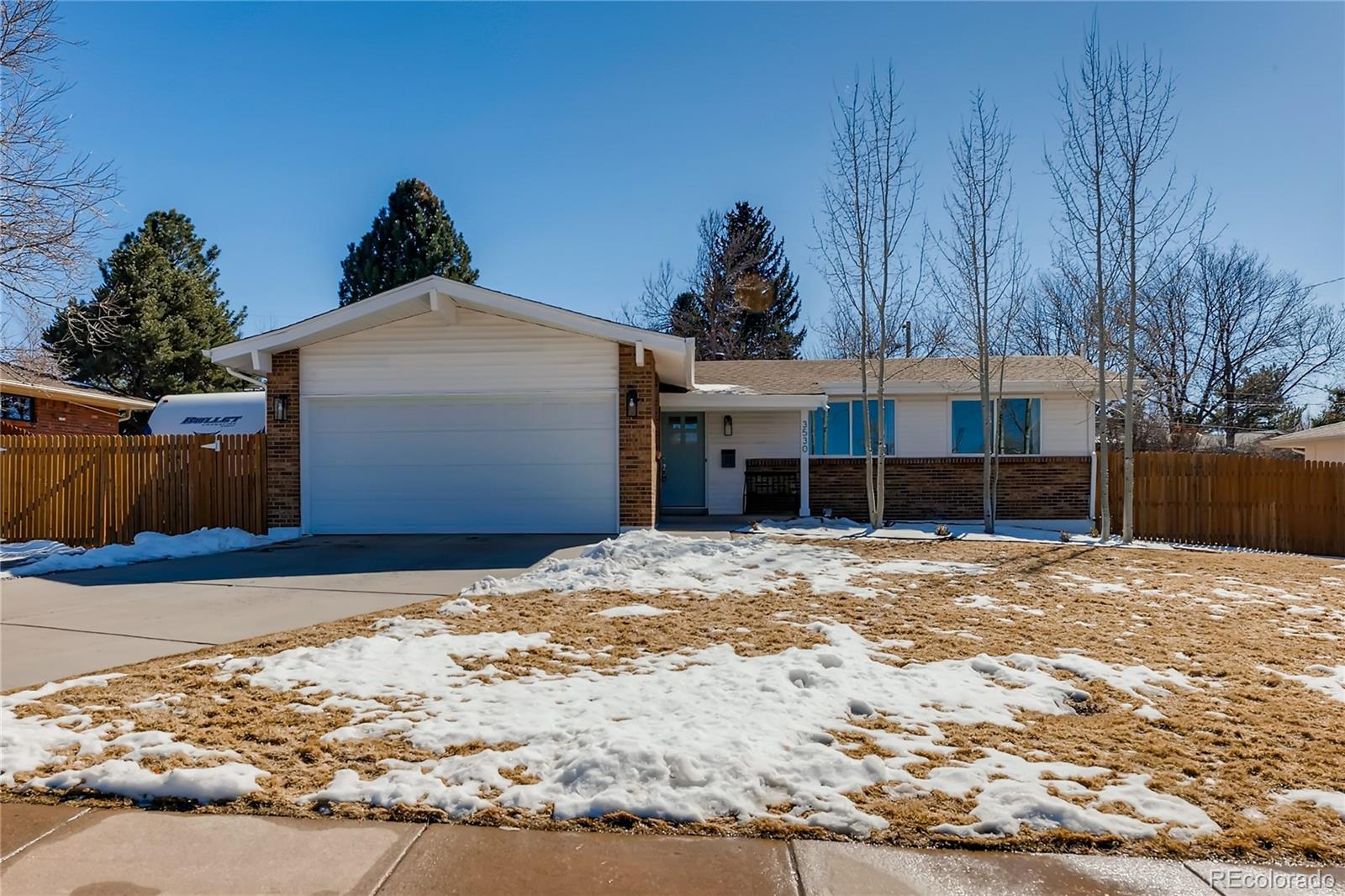 3530 East Orchard Road Centennial, CO 80121 - Photo 34 of 35 a view of a house with snow
