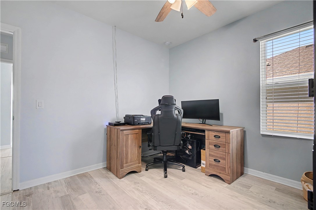 2613 Manzilla Lane Cape Coral, FL 33909 - Photo 20 of 42 a view of workspace with furniture