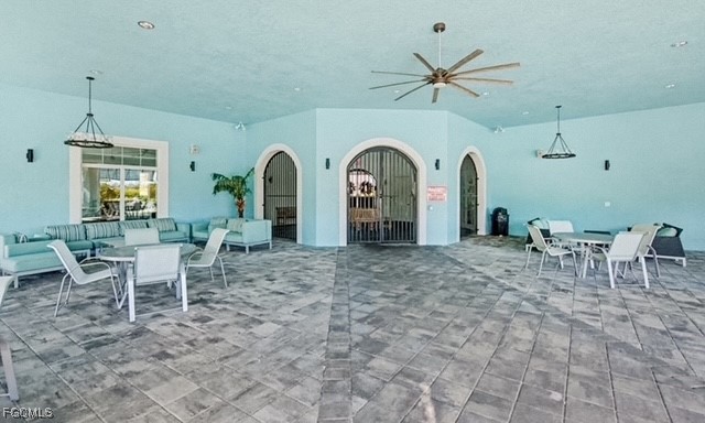 2613 Manzilla Lane Cape Coral, FL 33909 - Photo 31 of 42 a view of a livingroom with furniture and floor to ceiling window