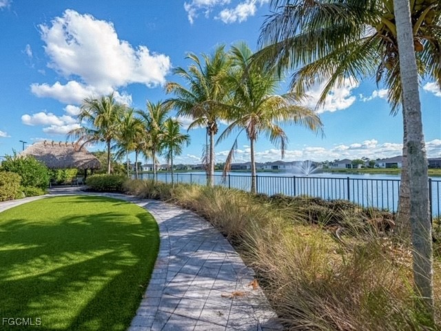 2613 Manzilla Lane Cape Coral, FL 33909 - Photo 33 of 42 a view of a yard with palm trees