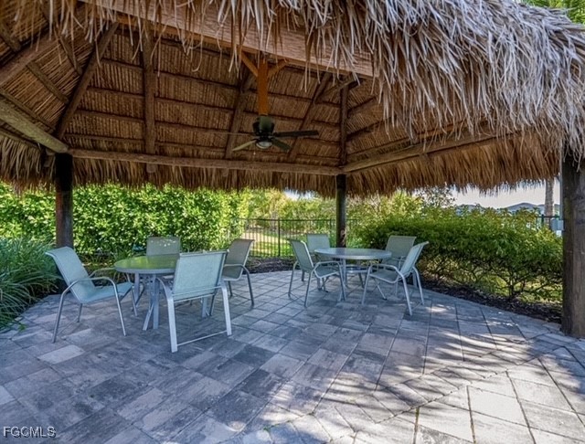 2613 Manzilla Lane Cape Coral, FL 33909 - Photo 34 of 42 a view of a table and chairs in patio