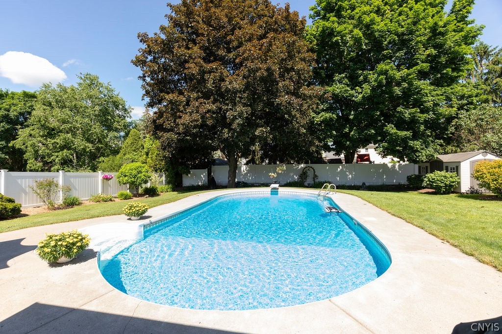 7454 Thunderbird Road Clay, NY 13088 - Photo 5 of 48 Heated Saltwater Pool.