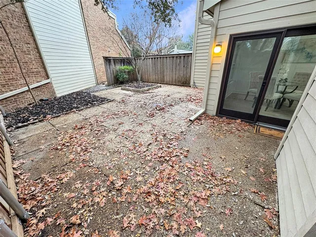 a view of a backyard of a house
