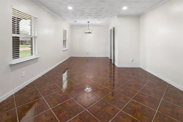 a view of a room with a sink and a window