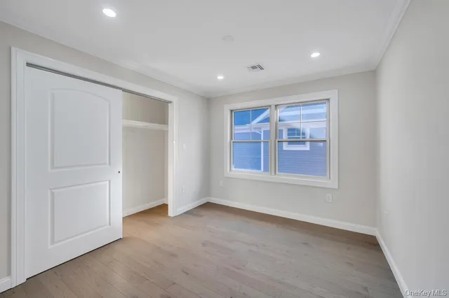 a bathroom with a sink toilet double vanity and shower