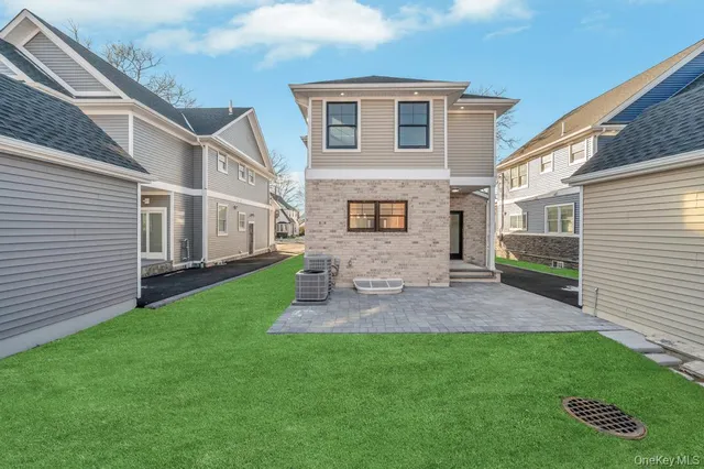 a view of a back yard of the house