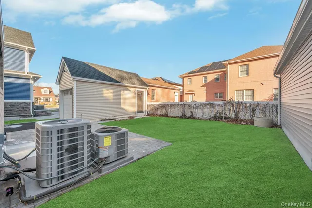 a view of a house with backyard porch and garden