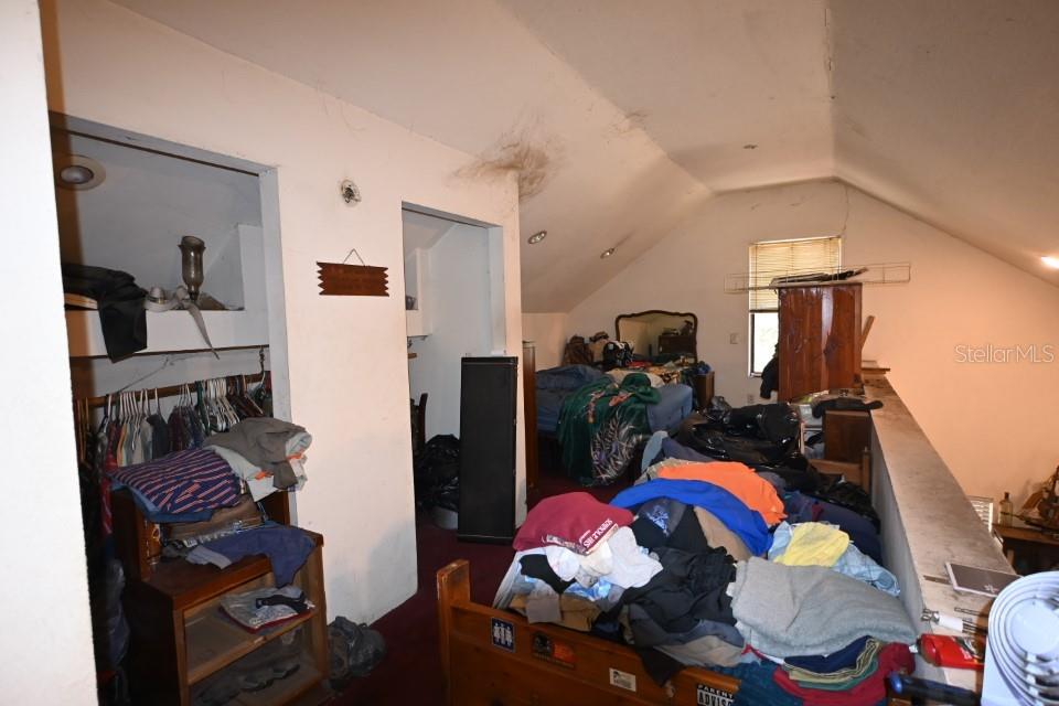 39716 Tworut Road Webster, FL 33597 - Photo 13 of 36 a living room with furniture and a wooden floor