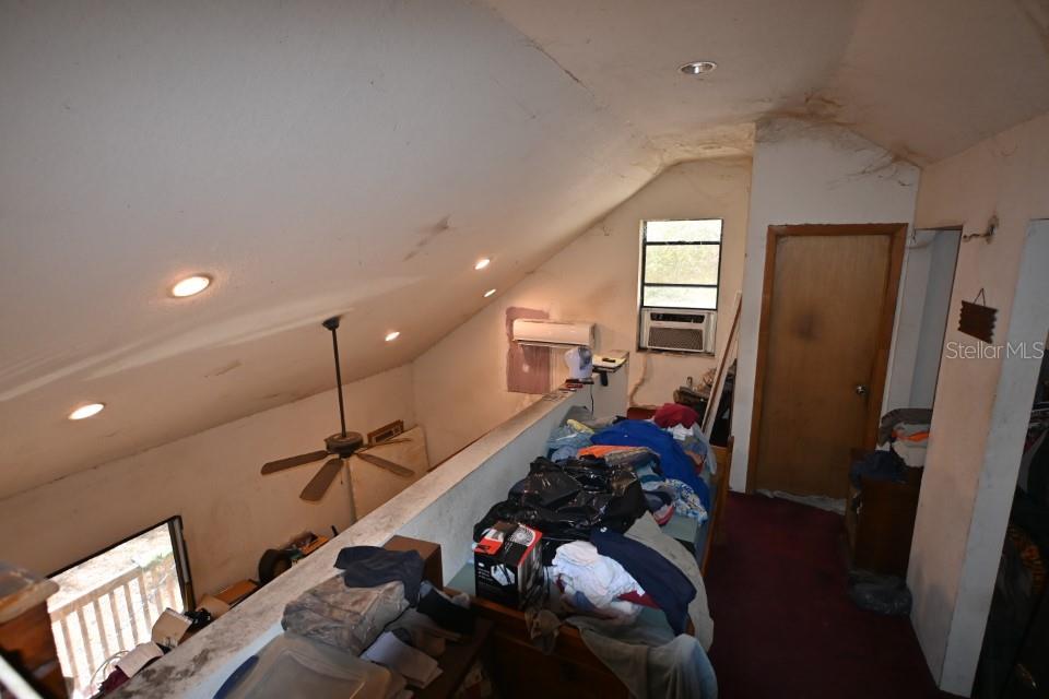 39716 Tworut Road Webster, FL 33597 - Photo 15 of 36 a room with furniture and a ceiling fan