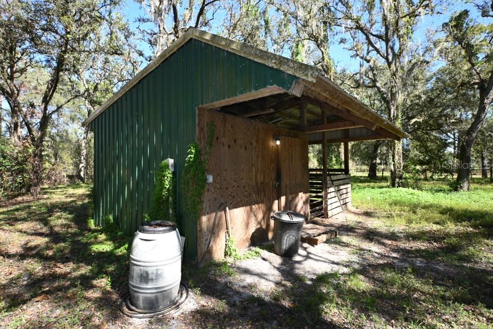 39716 Tworut Road Webster, FL 33597 - Photo 19 of 36 a view of a chair and tables in the patio
