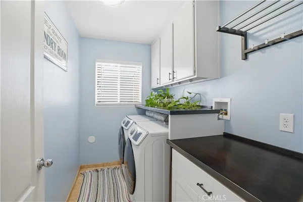 a view of cabinets and window