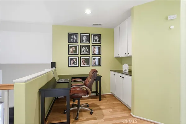 a workspace with wooden floor