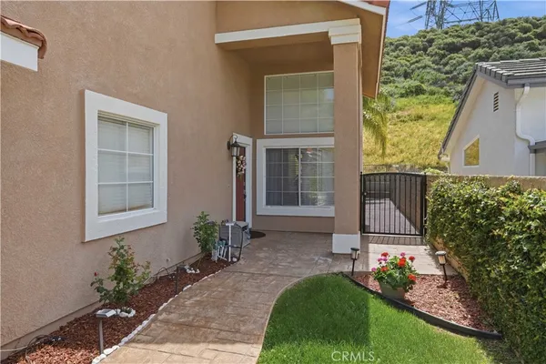 a view of a house with a garden
