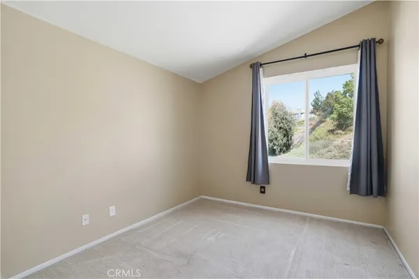 an empty room with window