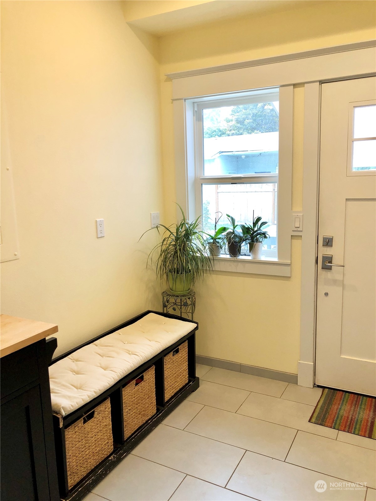 375 Southeast Bush Street Issaquah, WA 98027 - Photo 18 of 40 a hallway with a table and a window