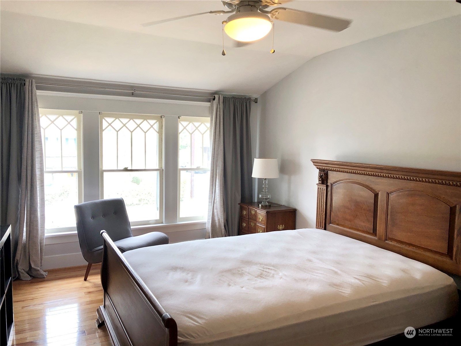 375 Southeast Bush Street Issaquah, WA 98027 - Photo 21 of 40 a bedroom with a large bed and a large window